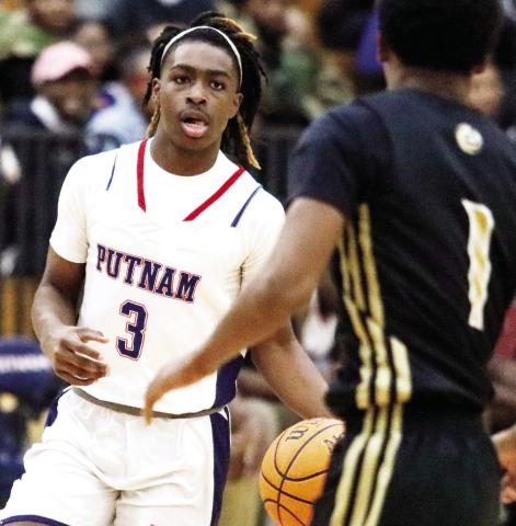 Putnam County sophomore J’mari Greene (3) led in scoring with 16 points in the loss to Hancock Central last week. Greene is currently the team’s secondleading scorer, averaging 14.7 points per game behind senior guard Landon Bonner. LANCE McCURLEY/File photo