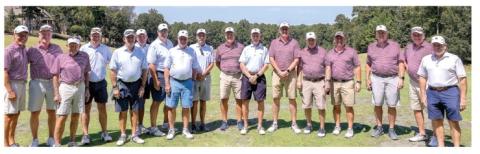 Team Cross and Team McCleave pose for a photo before the competition began. LEIGH LOFGREN/Staff
