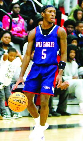 Senior Jaylin Harper (5) scored 14 points in a win over Hancock Central on Nov. 30. LANCE McCURLEY/Staff