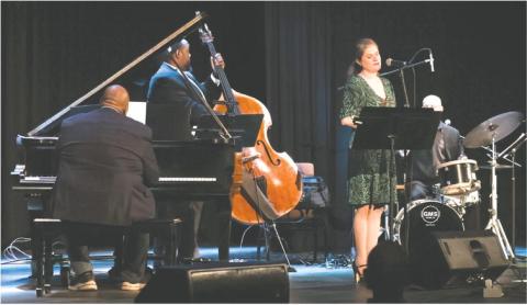 Vocalist Nicole Chillemi joined Jazz Legacy musicians (l-r) Louis Heriveaux on piano, bassist Kevin Smith, drummer and narrator Justin Varnes, and saxophonist John Sandfort (below) in presenting the music of Georgia native Johnny Mercer last week at Festival Hall in Greensboro. 