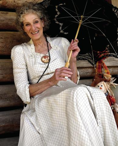 Virginia Linch of Butterflies and Blooms at the Briarpatch, welcomed guests to one of Stepback’s numerous log cabins. IAN TOCHER/Staff