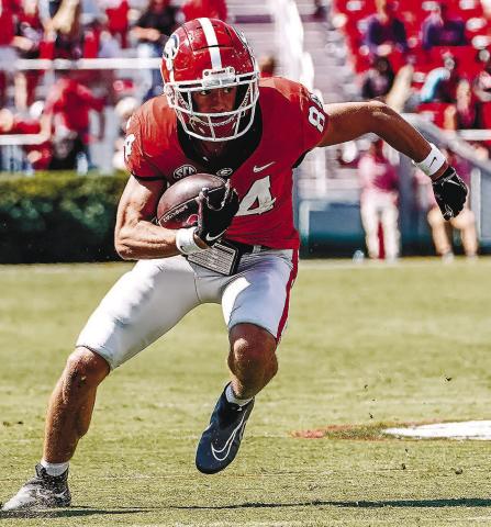 Georgia wide receiver Ladd McConkey (84) cuts up field before stepping out-of-bounds on a catch against Kent State. JACK OZMER/UGA Athletics