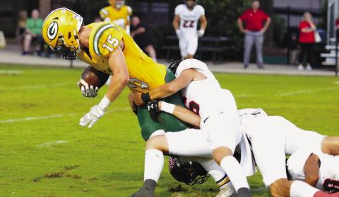 Gatewood senior Lawson Wooten (15) scored twice last Friday against CFCA in Macon, including a fumble recovery in the end zone after a botched CFCA punt attempt. IAN TOCHER/File photo