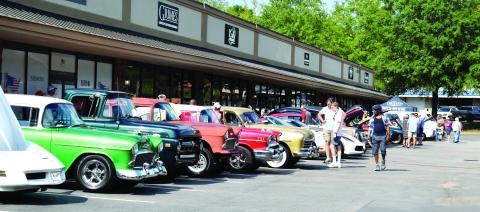 Dozens of hot-rodded rides showed up Saturday for the inaugural Bruzze Brewing Classic Car Show, staged in honor of Jerry Smith, who once operated a car museum in the same space the brewery now occupies alongside Scott Road in eastern Putnam County. (T. MICHAEL STONE/Staff)