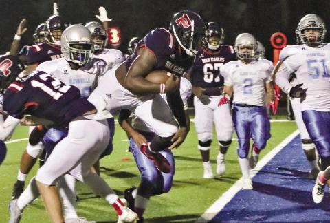 Peters (27) crosses the goal line for a score against Glenn Hills last season. ARELLA CASH/Staff