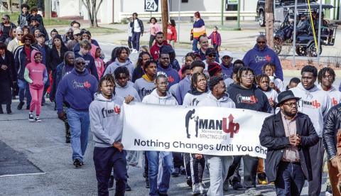 Putnam County residents march on MLK Day last week. IAN TOCHER/Staff