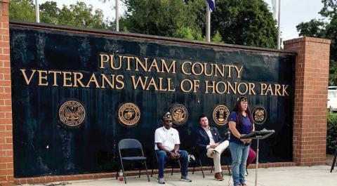 U.S. Army veteran and VFW Veterans of Foreign Wars Commander Nikki Barker introduced Putnam County Clerk of Courts Trevor Addison (center) as the guest speaker last Wednesday during a 9/11 remembrance ceremony in Eatonton. CONTRIBUTED