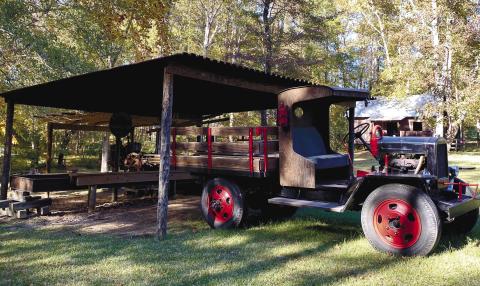 The 1928 replica farm truck beside the sawmill, which held working demonstrations. EMME CLAUSE/Staff