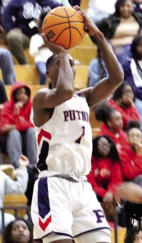 Eren Banks (1) pulls up for a shot earlier this month against Butler. ARELLA CASH/Staff