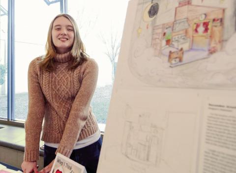 Putnam County High School junior December Arnett was among several students displaying her work last week as part of the “Putnam Model” of education. IAN TOCHER/Staff