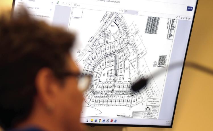 Putnam County Permit Manager Rindi Daniel with the Public Works Department briefly addressed the commission to recommend the county acceptance the roads for the Harmony Farm subdivision phase three, Harmony Farms Orchard, and Harmony Grove Court. IAN TOCHER/Staff