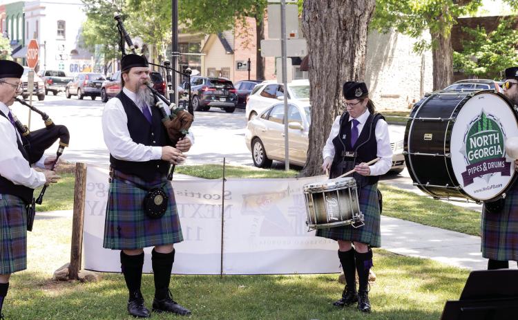 Bagpipers and drummers play outside as attendees arrive to First Presbyterian Church in Greensboro for Scottish Heritage Day. LEIGH LOFGREN/Staff
