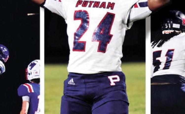 Putnam’s OLB Blake Williams (24) does the “no fly zone” celebration after making a tackle in the backfield Friday night.