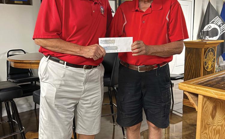 On Aug. 18, Lake Oconee Elks Lodge President Chuck Brake (left) presented a $3,500 check to Putnam Christian Outreach Director Rex Corlett for PCO’s use to help feed local citizens. CONTRIBUTED